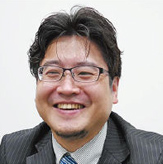 画像：運行情報事業部 運営グループ グループリーダー兼 システムグループ 伊藤 祐一 様